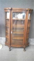 CURVED GLASS FRONT CURIO CABINET