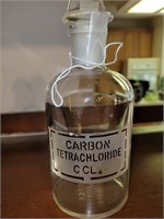 Glass Apothecary bottle. Marked carbon