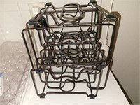 Four metal dishware racks