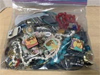 Bag full of various costume jewelry