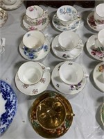 7 Teacups and Saucers