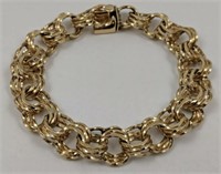 14 Kt Yellow Gold Triple Charm Bracelet