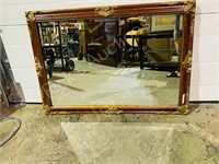 ornate framed wall mirror