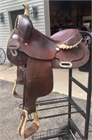 Longhorn saddle w/ some silver tooling, 14 1/2”