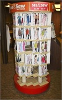 rotating See & Sew pattern rack w/lots of patterns