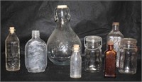 8 misc glass bottles