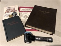 Coin books And magnifier