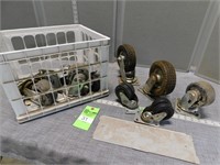 Assorted sizes of casters and metal dividers