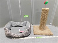 Scratching post, pet bed and a FurBuster