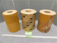 3 - 12" Rolls of drum sandpaper; appears to be 10