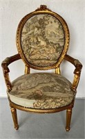 Carved Upholstered French Arm Chair