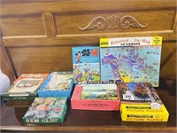 7 vintage puzzles in boxes