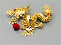gold tone Chinese dragon brooch