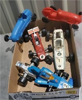 Full box of toy race cars