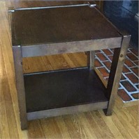 Dark wood modern end table with angled legs 24? x
