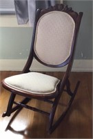 Upholstered and wood folding rocking chair,