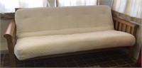 Wooden Mission style futon with ivory pad