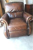 Leather recliner upholstered w/ brass 42" tall (fl