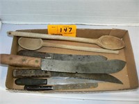 FLAT WITH PRIMITIVE KITCHEN KNIVES AND WOODEN