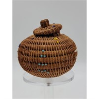 A Fine Handwoven Native American Beaded Basket