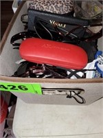 CONTAINER OF SUNGLASSES AND CASES
