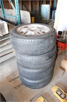 4 - 235/55ZR17 TIRES & FORD RIMS