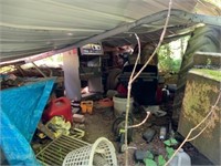 CONTENTS UNDER CARPORT - FORD TRACTOR, CHAIN SAW,