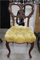 CARVED UPHOLSTERED ACCENT CHAIR