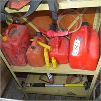 4 gas containers plus hand pump