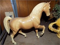 Plastic palomino horse