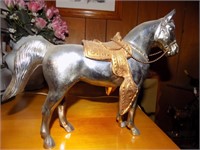 Silver brass horse