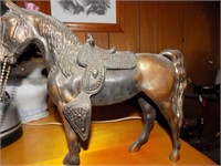 Brass horse with saddle