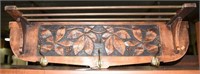 Lot #1629 - Carved wall shelf with floral motif