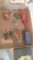 Flat of vintage toys including a working noise