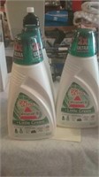 Three bottles of Bissell Little Green Cleaner