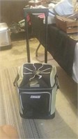 Nice Coleman black and green rolling cooler