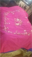 Dark pink silk bedspread with flowers