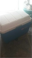 Blue and white Coleman ice chest