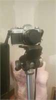 Canon AE-1 35 millimeter camera with nice tripod