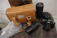 Minolta camera with bag, Lens