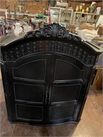 TOP OF CARVED WOOD BLACK ARMOIRE