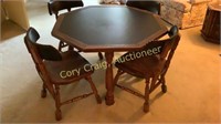 Leather inland top table and 4 chairs.  Sturdy