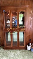 Curio display cabinet with mirrored back lighted