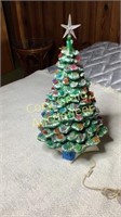 Ceramic Christmas tree on music box stand lights