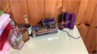 Alarm clock radio, flash lights and beverages