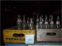 2 wooden Pepsi crates with 19 bottles