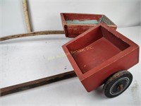 2 wooden children's pull behind wagons, one with