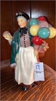 Heavy plaster chalkware flower seller balloon