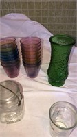 Plastic cups, green vase, white glass, cabbage