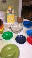 Plastic bowls, Pyrex container, collie jar and